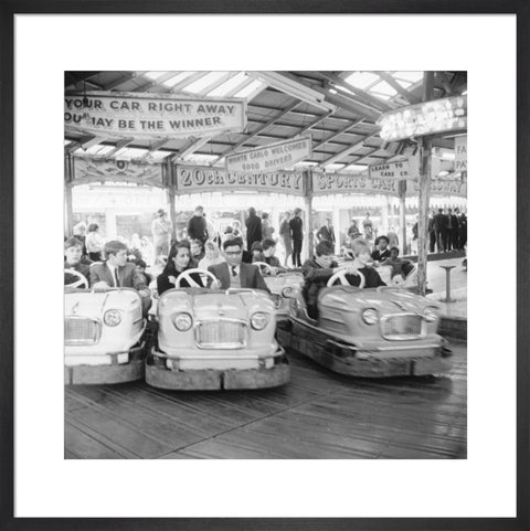 Couples on the dodgems ride Battersea Park fun fair 1966