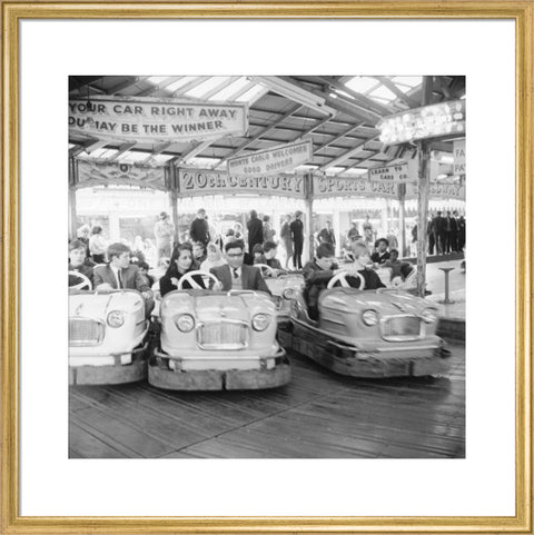 Couples on the dodgems ride Battersea Park fun fair 1966