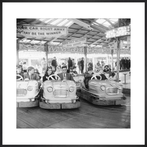 Couples on the dodgems ride Battersea Park fun fair 1966