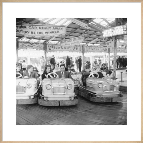 Couples on the dodgems ride Battersea Park fun fair 1966