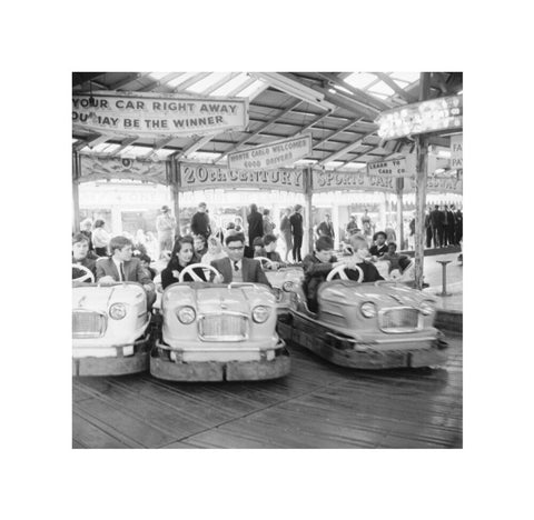 Couples on the dodgems ride Battersea Park fun fair 1966