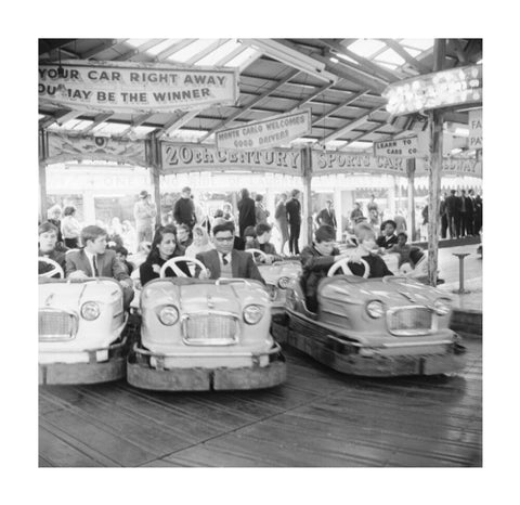 Couples on the dodgems ride Battersea Park fun fair 1966