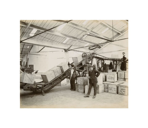 Tea on a conveyor system Tilbury Docks c. 1920