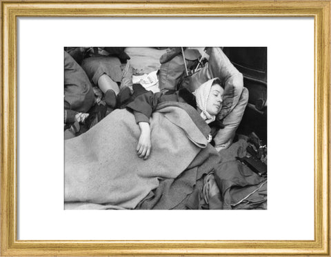 A woman camps out on the street for Queen Elizabeth's Coronation 1953