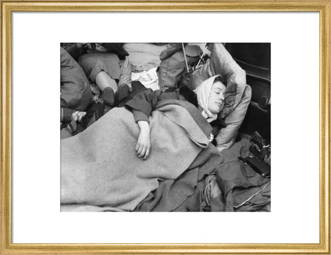 A woman camps out on the street for Queen Elizabeth's Coronation 1953