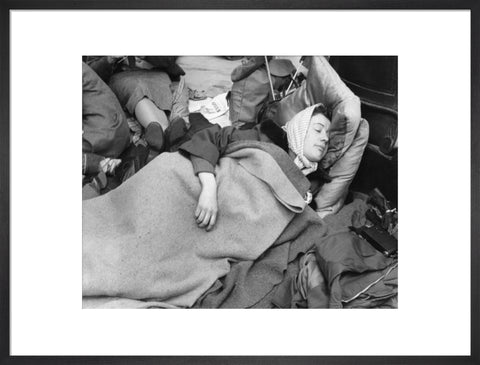 A woman camps out on the street for Queen Elizabeth's Coronation 1953