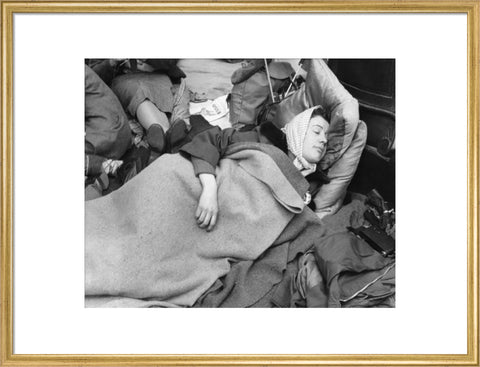 A woman camps out on the street for Queen Elizabeth's Coronation 1953