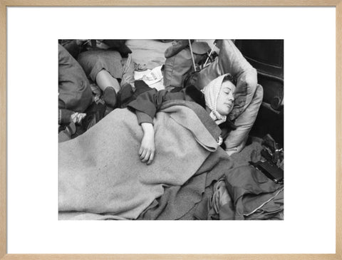 A woman camps out on the street for Queen Elizabeth's Coronation 1953