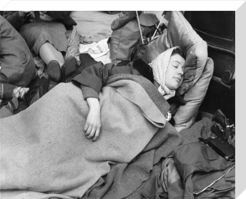 A woman camps out on the street for Queen Elizabeth's Coronation 1953