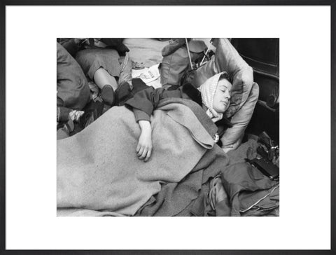 A woman camps out on the street for Queen Elizabeth's Coronation 1953