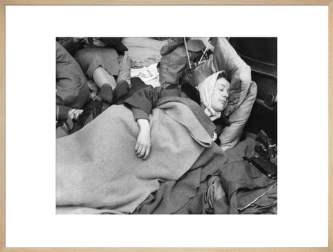 A woman camps out on the street for Queen Elizabeth's Coronation 1953