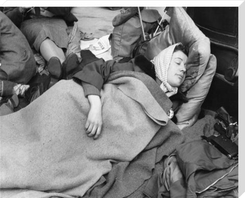 A woman camps out on the street for Queen Elizabeth's Coronation 1953