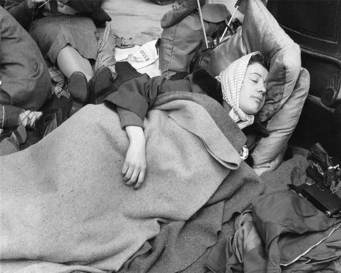 A woman camps out on the street for Queen Elizabeth's Coronation 1953