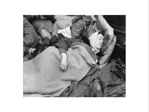 A woman camps out on the street for Queen Elizabeth's Coronation 1953