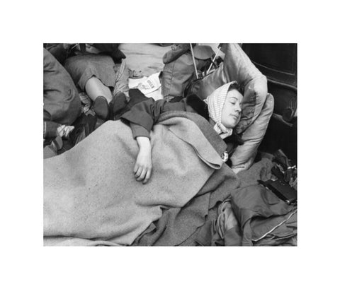 A woman camps out on the street for Queen Elizabeth's Coronation 1953