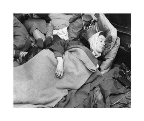 A woman camps out on the street for Queen Elizabeth's Coronation 1953