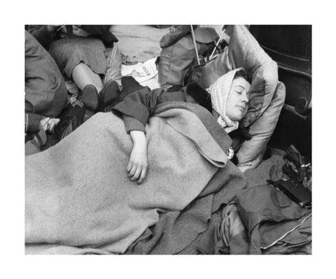 A woman camps out on the street for Queen Elizabeth's Coronation 1953