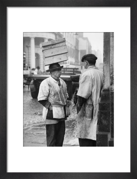 Two men in conversation outside Billingsgate Fish Market 1958