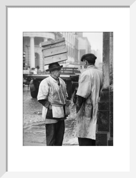 Two men in conversation outside Billingsgate Fish Market 1958