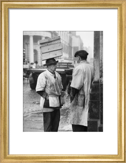 Two men in conversation outside Billingsgate Fish Market 1958