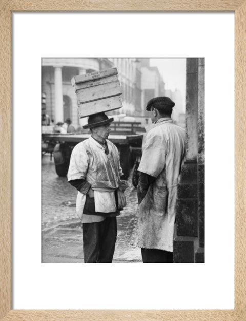 Two men in conversation outside Billingsgate Fish Market 1958