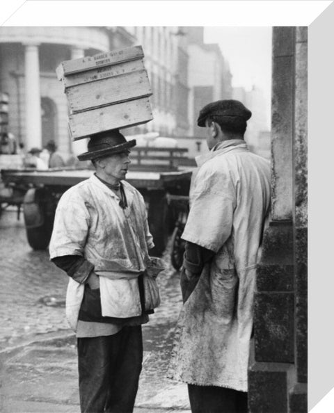 Two men in conversation outside Billingsgate Fish Market 1958