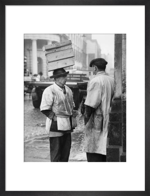 Two men in conversation outside Billingsgate Fish Market 1958