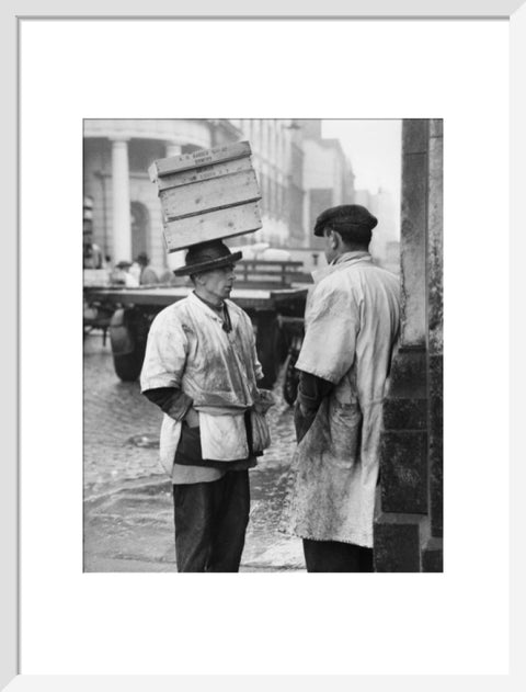 Two men in conversation outside Billingsgate Fish Market 1958