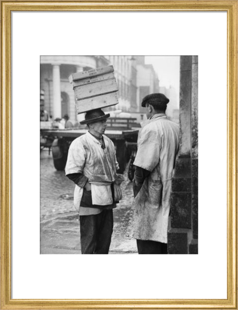 Two men in conversation outside Billingsgate Fish Market 1958