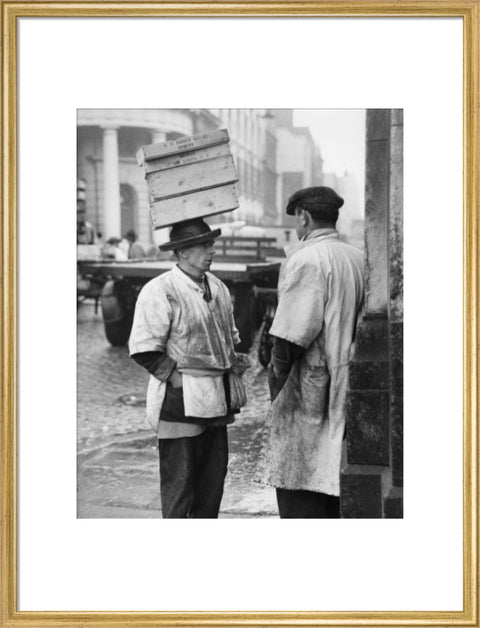 Two men in conversation outside Billingsgate Fish Market 1958