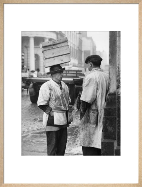 Two men in conversation outside Billingsgate Fish Market 1958