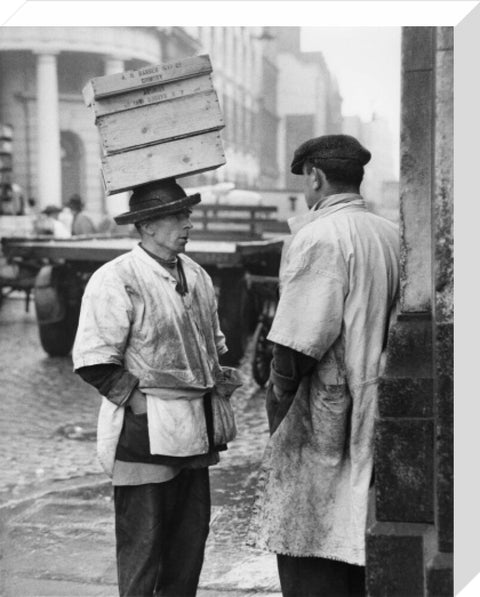 Two men in conversation outside Billingsgate Fish Market 1958