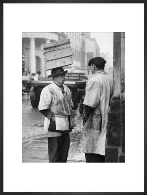 Two men in conversation outside Billingsgate Fish Market 1958