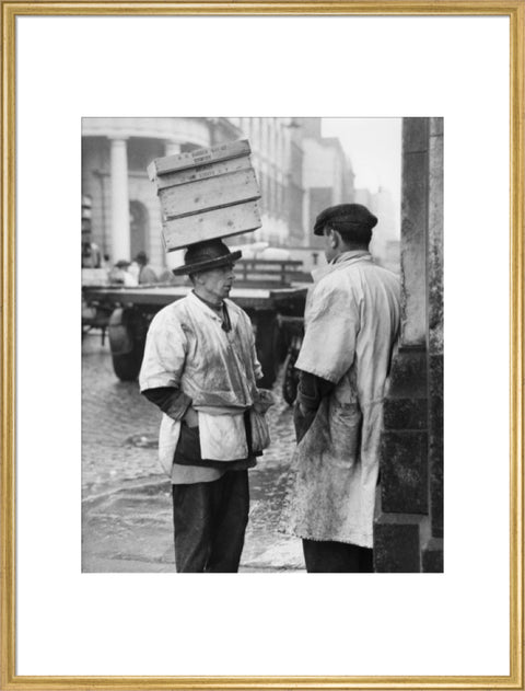 Two men in conversation outside Billingsgate Fish Market 1958