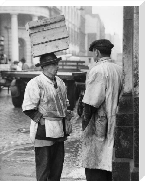 Two men in conversation outside Billingsgate Fish Market 1958