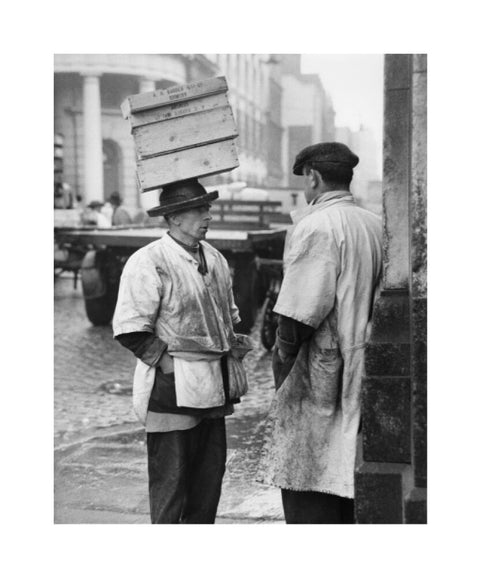 Two men in conversation outside Billingsgate Fish Market 1958