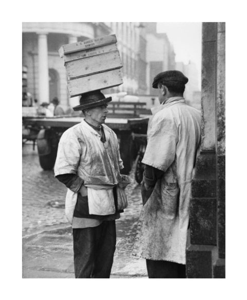 Two men in conversation outside Billingsgate Fish Market 1958