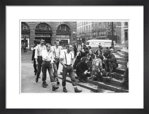 Group of skinheads & hippies in Piccadilly Circus 1969