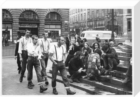 Group of skinheads & hippies in Piccadilly Circus 1969