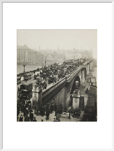 People crossing London Bridge c1900