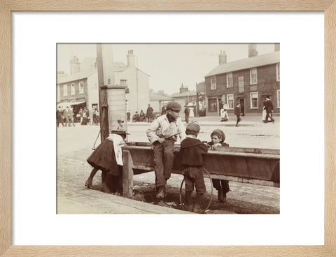Children Children playing at a water trough in Barnet High Street c.1900