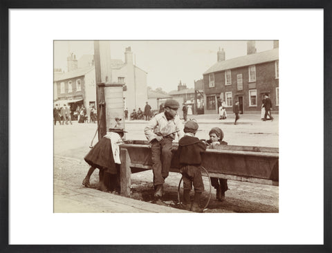Children Children playing at a water trough in Barnet High Street c.1900