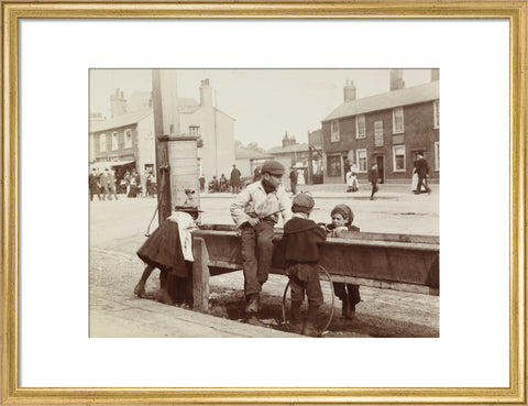 Children Children playing at a water trough in Barnet High Street c.1900