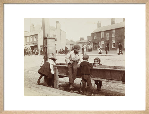 Children Children playing at a water trough in Barnet High Street c.1900