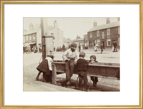 Children Children playing at a water trough in Barnet High Street c.1900