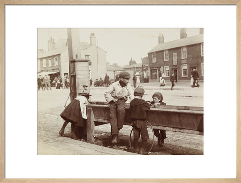 Children Children playing at a water trough in Barnet High Street c.1900