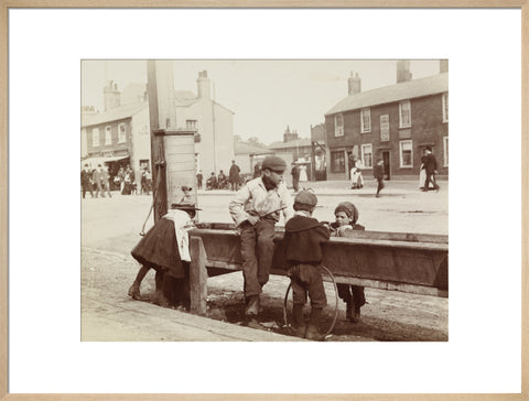 Children Children playing at a water trough in Barnet High Street c.1900