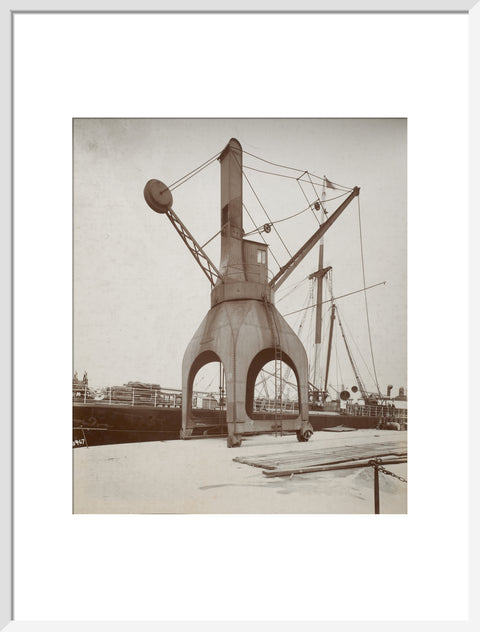 Disharge of cargo by hydraulic crane c.1920