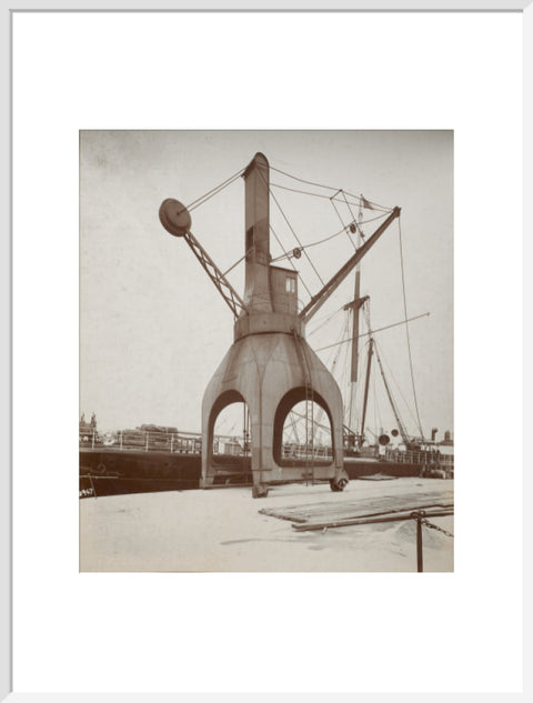 Disharge of cargo by hydraulic crane c.1920