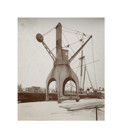 Disharge of cargo by hydraulic crane c.1920